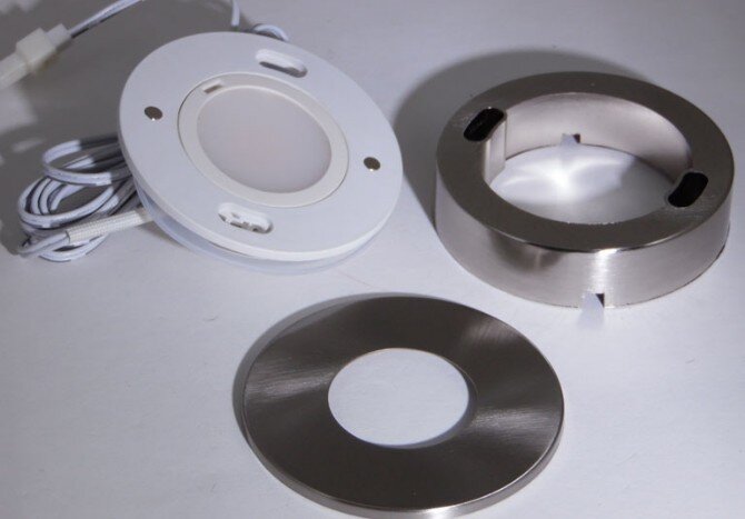 LED light shown with brushed nickel trim ring and surface ring