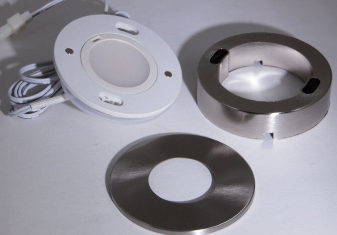 LED light shown with brushed nickel trim ring and surface ring LED light shown with brushed nickel trim ring and surface ring